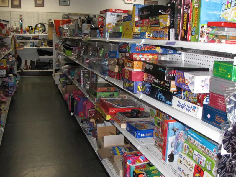 Toys and board games in a metal shelf